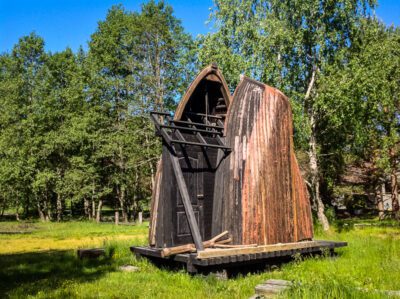 A shed built of out two halves of a fishing boat.